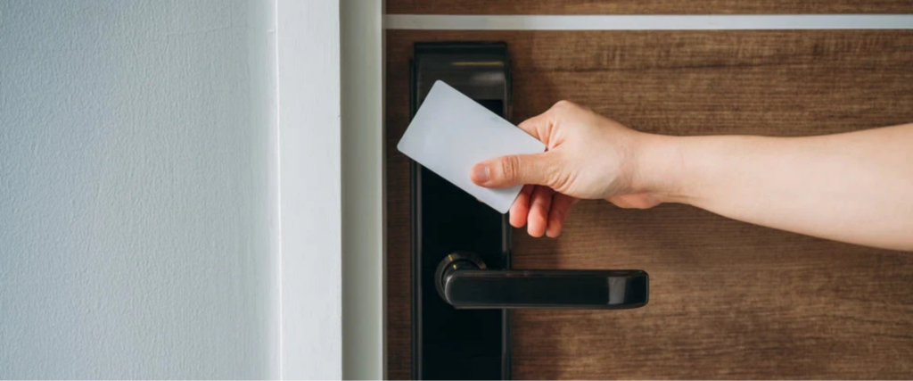RFID access control reader authenticating a contactless card at a building entrance